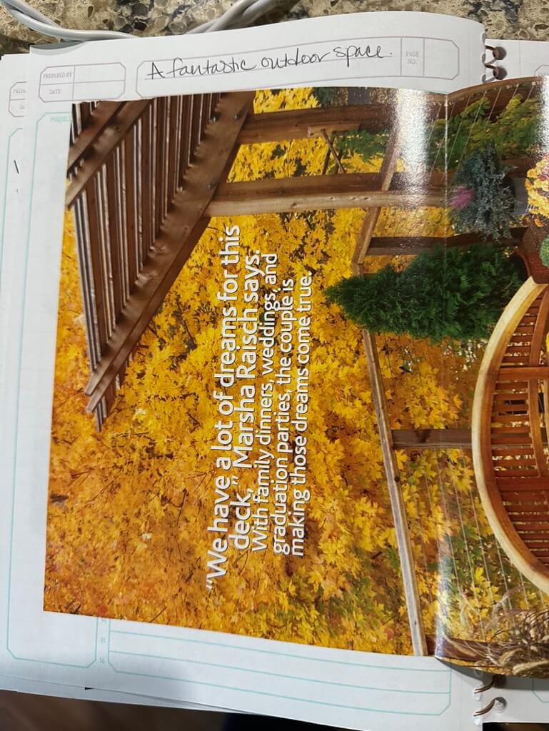 Photo 2) handwritten words at the top "A fantastic outdoor space" The image shows fall colored leaves, a deck railing, the top of a bench and a Deck Pergola.