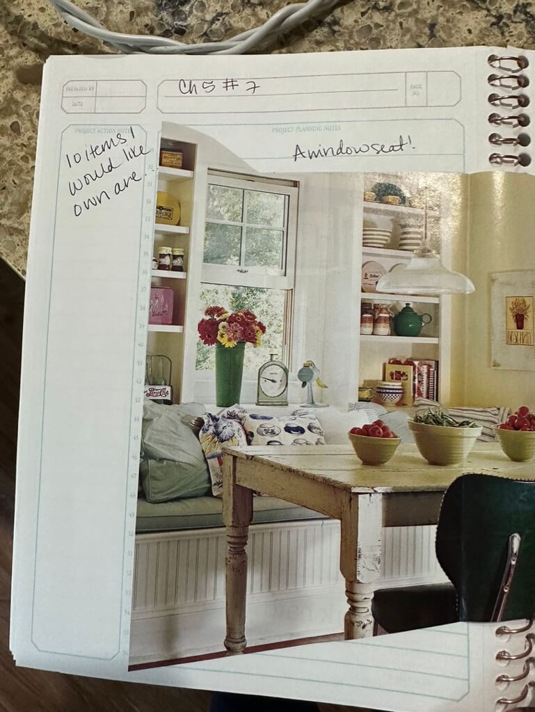Intention setting Photos pasted in a spiral bound lined notebook. Photo 1) words handwritten on the top of the page Ch 5 #7 (referring to prompt in the Artist's Way), below that and to the left: "10 items I would like to own are" and handwritten above the magazine photo "A window seat!" The image is of a kitchen with a window seat under a window flanked by two shelves. there is a table in front of the window seat. Photo 2) handwritten words at the top "A fantastic outdoor space" The image shows fall colored leaves, a deck railing, the top of a bench and a Deck Pergola. Photo 3) Handwritten words at the top "A porch...not this one but a porch non the less." The image shows a large white house with a wrap-around porch on the main level and an additional porch on the top floor. 